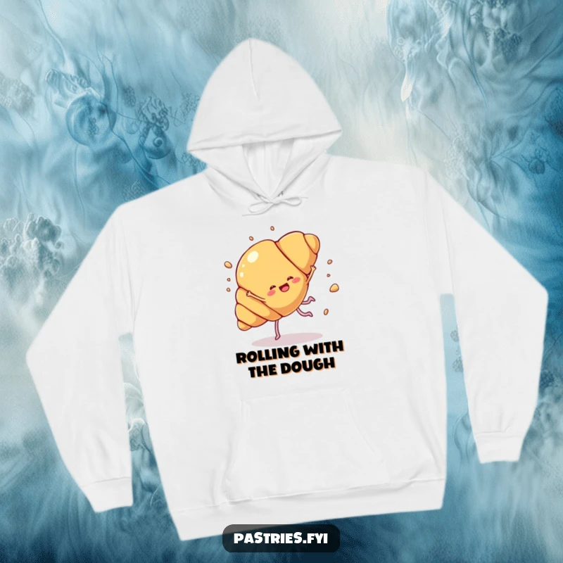 Funny croissant cartwheel hoodie showing a croissant character with legs doing a joyful cartwheel with flakes flying, perfect for cozy wear.