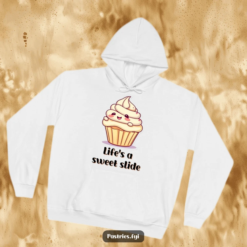 Funny hoodie showing a giggling cupcake character in motion, sliding smoothly on a colorful swirl of frosting, a cozy and humorous gift.
