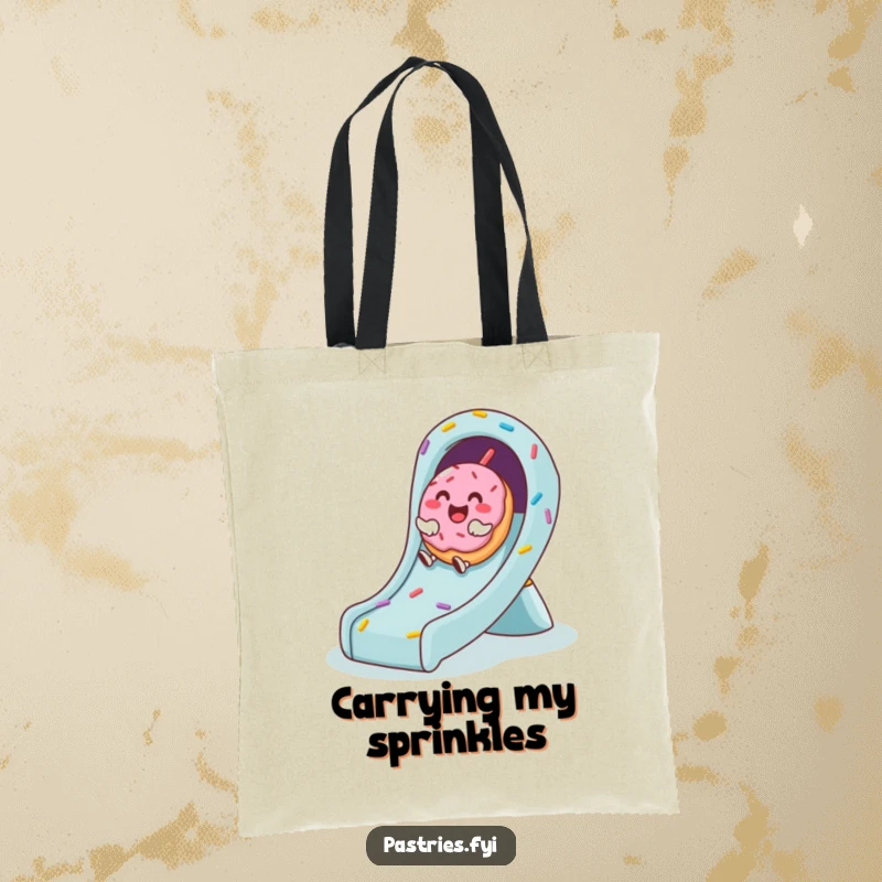 Funny tote bag depicting a happy donut character giggling as it slides down a fun, sprinkle-covered amusement slide.